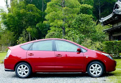 Red Toyota Prius side view by Joi on Flickr