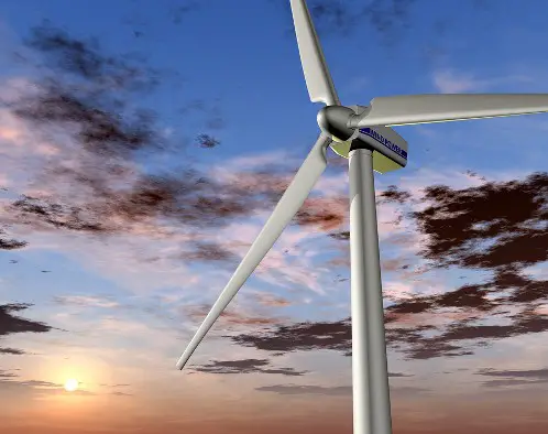 Wind powered turbine with sunset sky